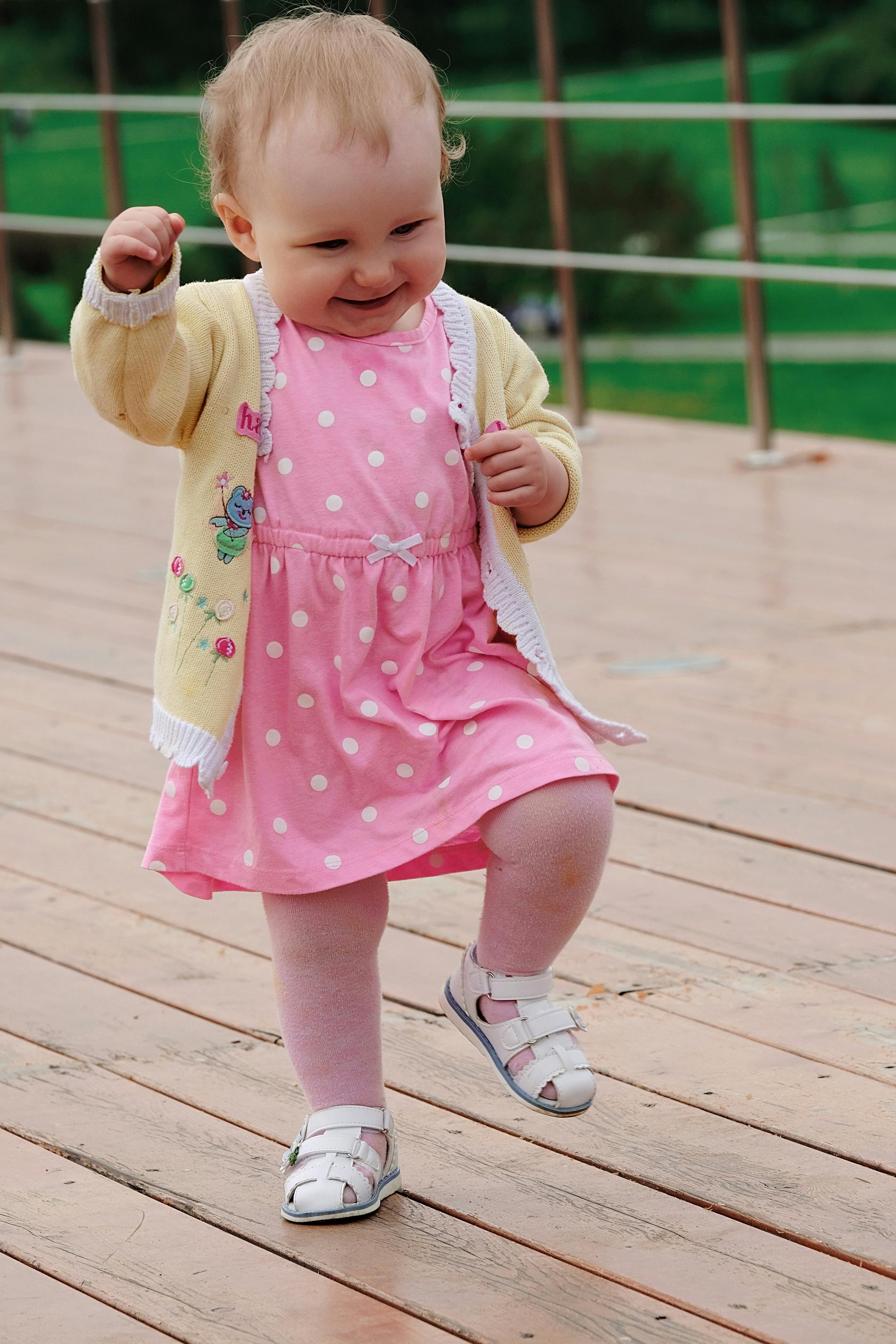 Photo by Анна Хазова: https://www.pexels.com/photo/cheerful-toddler-walking-on-wooden-playground-4548356/